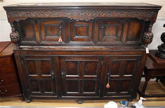 A 17th century large oak court cupboard, W.186cm, D.53cm, H.155cm